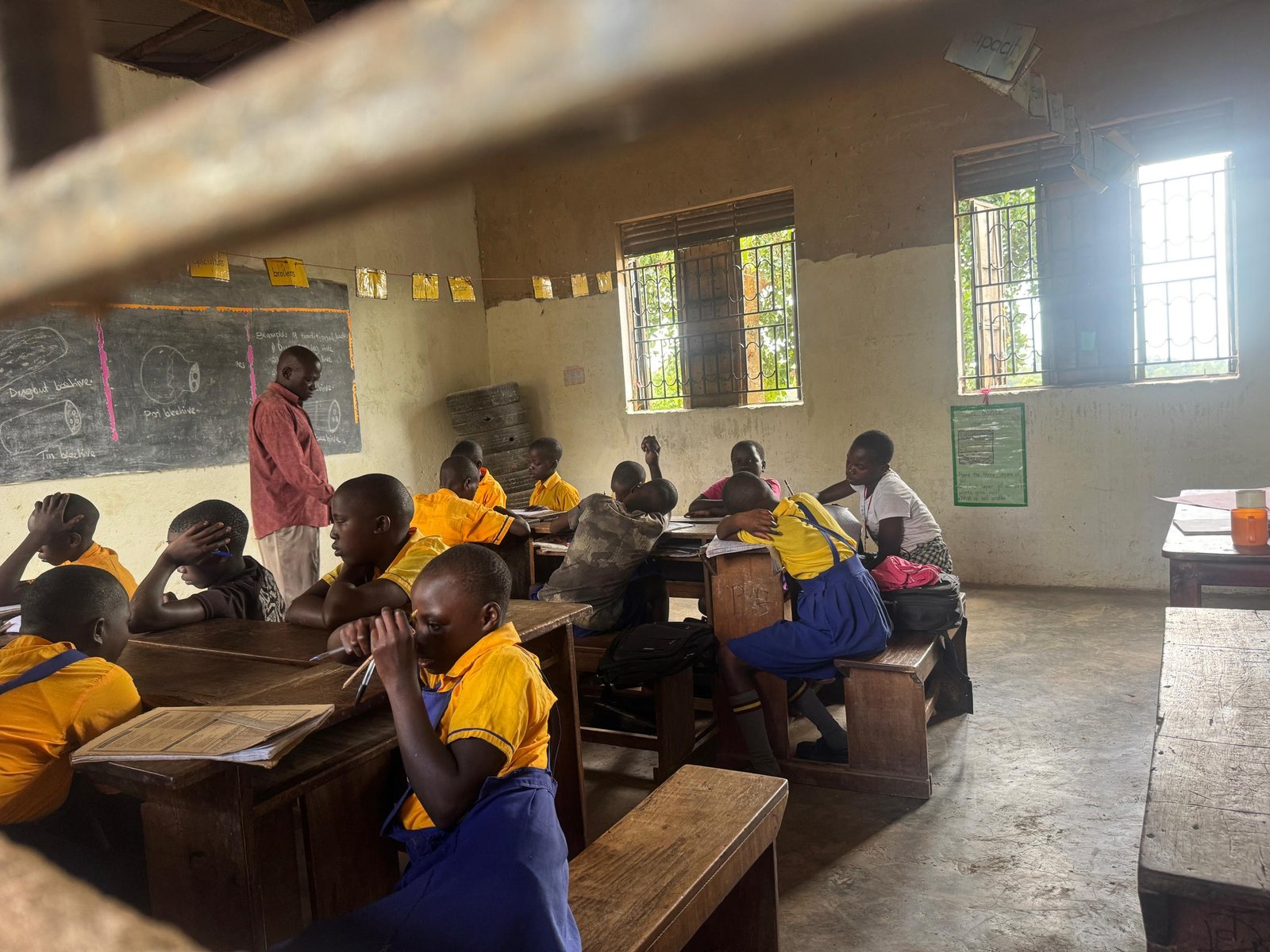 Children sitting in a bright classroom
