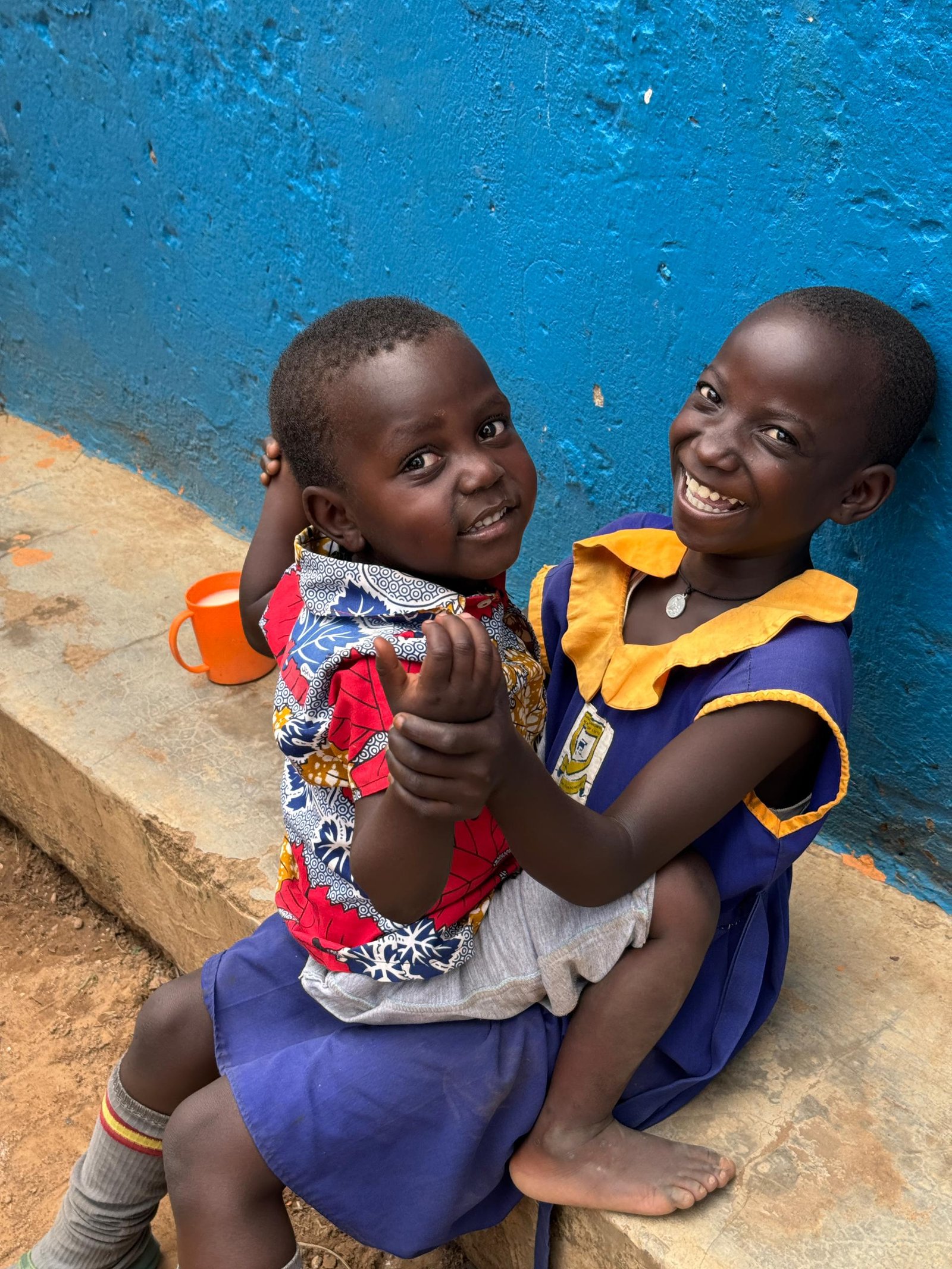 A child receiving compassionate medical care from a nurse at the foundation clinic