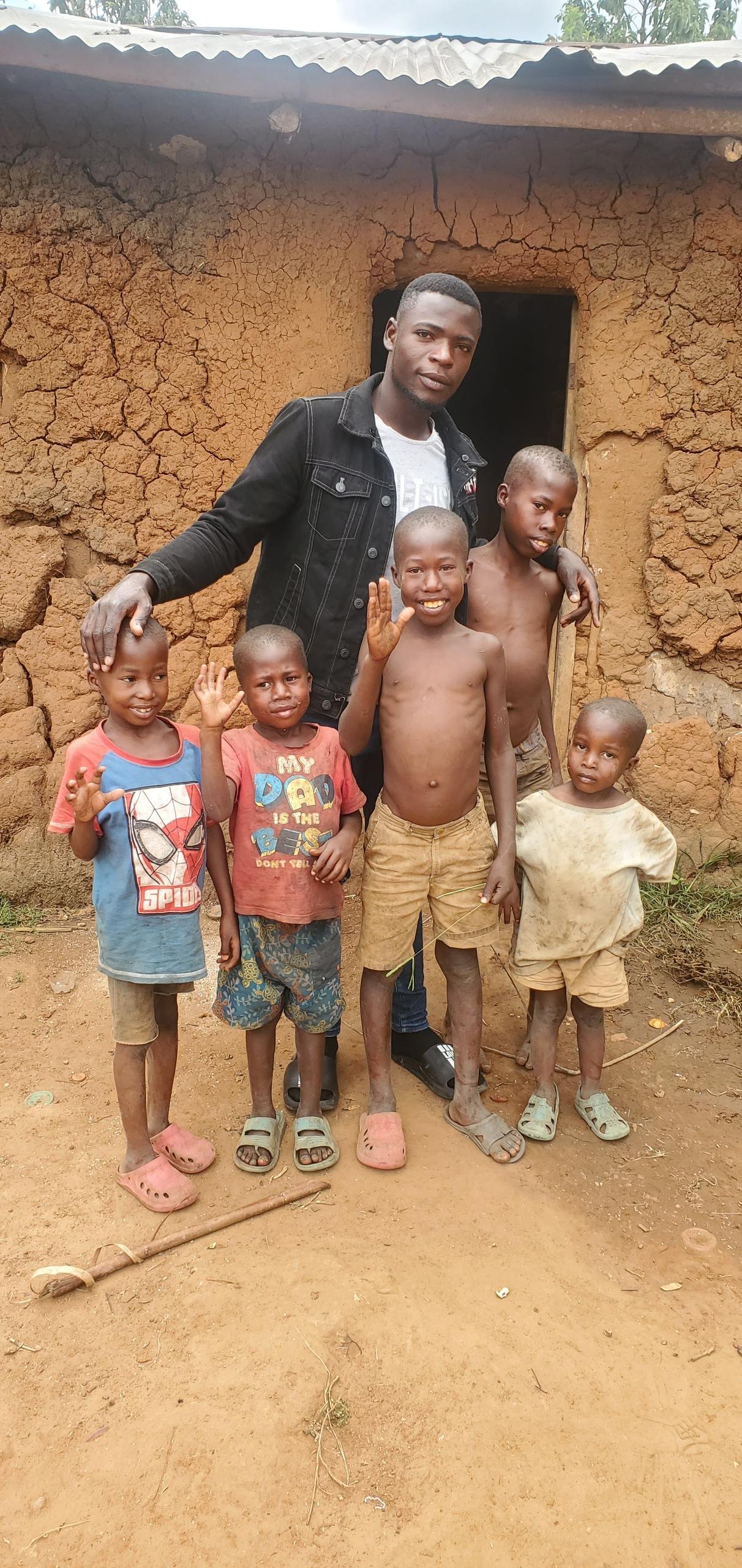 Patrick with the first children in a small rented room, 2016